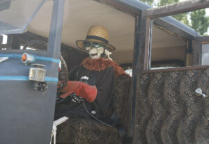 a 1927 Hudson 4 Door "rat rod" owned by Theresa and Sandy Segersons of Otis, Oregon was equipped with a skelton driver as one of the props. The car appeared at the Function 4 Junction, in Junction City, Oregon, June 4, 2016.